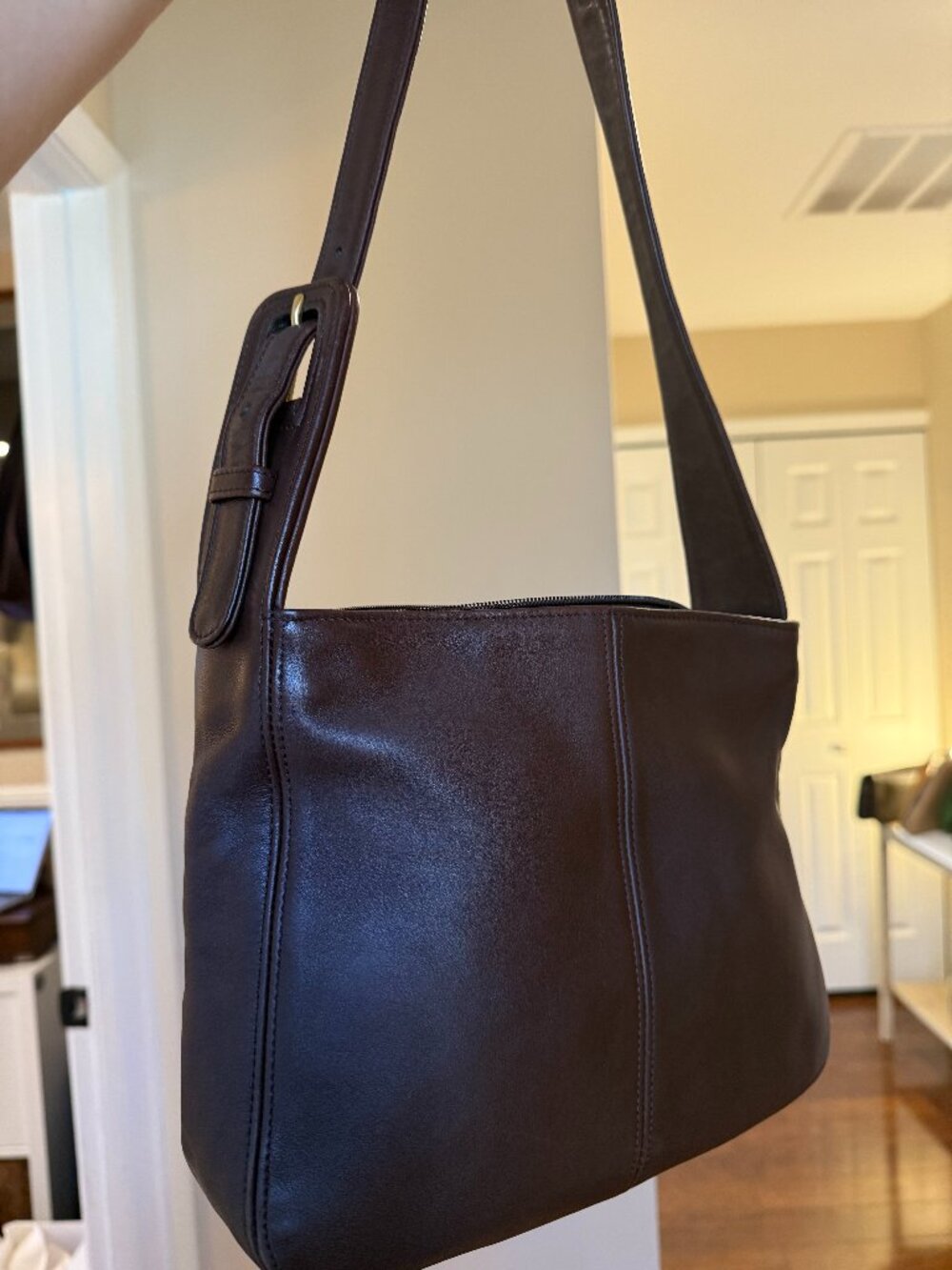 Flatiron Zip shoulder bag by Coach, check out that buckle!
